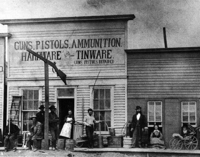 000 Hardware store and gunsmith, Dodge City 1872.jpg