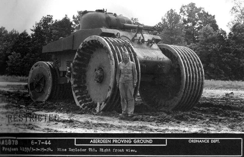 0000000 T-10 Mine Exploder, based on a highly modified Sherman..jpg