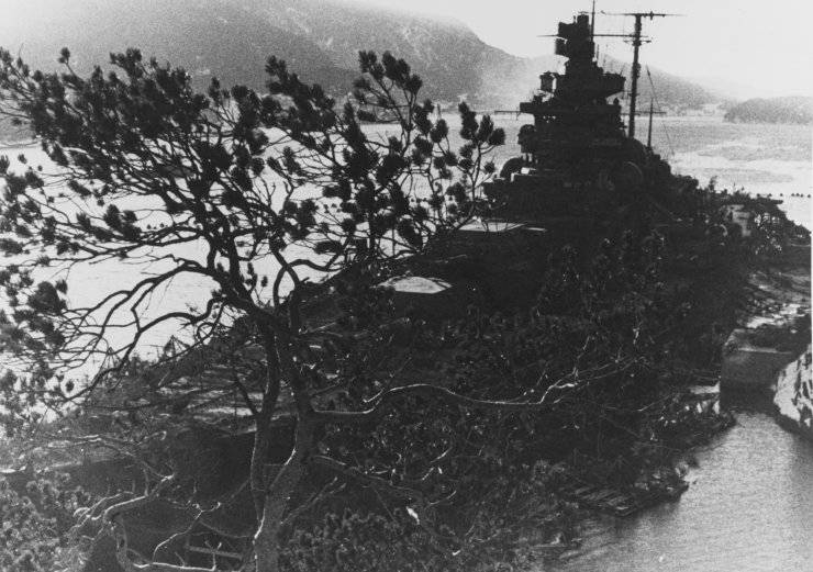 4-Camouflaged-at-her-moorings-at-Alta-fjord-Norway.jpg