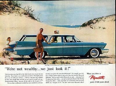 57 Plymouth Suburban Station Wagon Advert. #3 on the beach.jpg