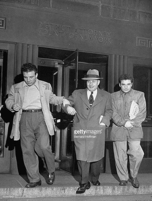 boxer-jake-lamotta-coming-out-of-the-district-attorneys-office-picture-id50447843.jpg