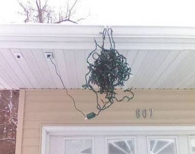 christmas+lights+up+on+the+house+in+a+mangled+ball+dr+heckle+funny+photo+blog.jpg