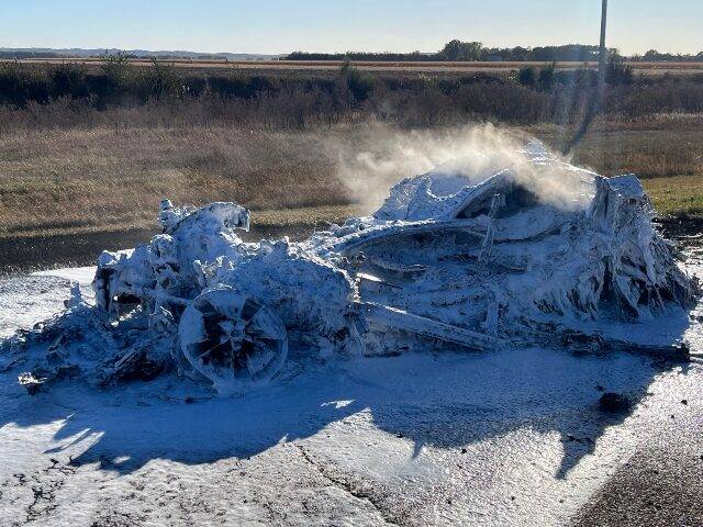 D) EV cars Battery Fires turned-into-a-pile-of-metal-by-battery-fire.jpg