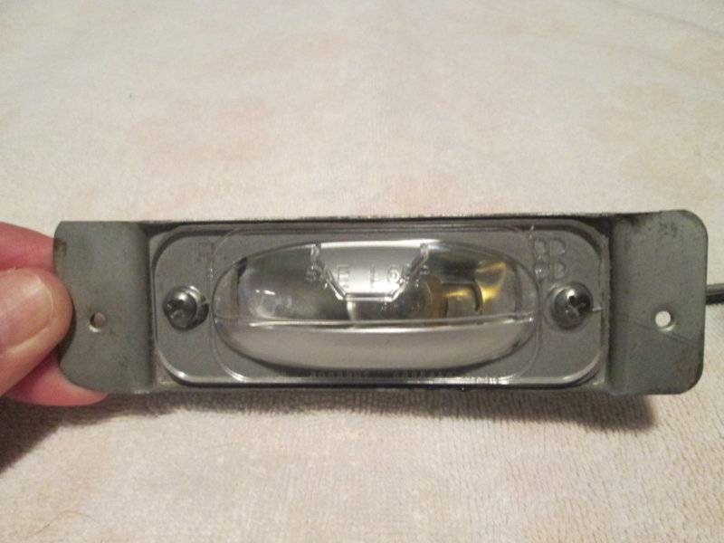 FOR SALE - 1965-1974 Mopar License Plate Lamp Assembly, P/N 2483297 ...