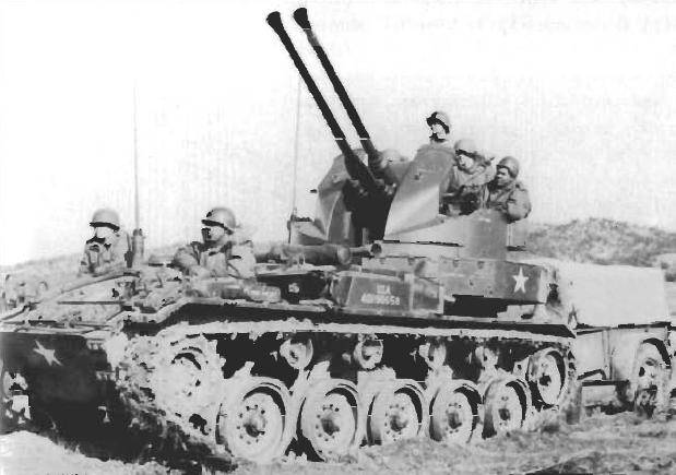 m19-twin-40mm-gun-motor-carriage-with-standard-m28-1-ton-ammunition-trailer.jpg