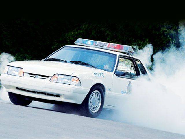 m5lp_0601_01z+1993_mustang_ssp+front_driver_side_burnout.jpg