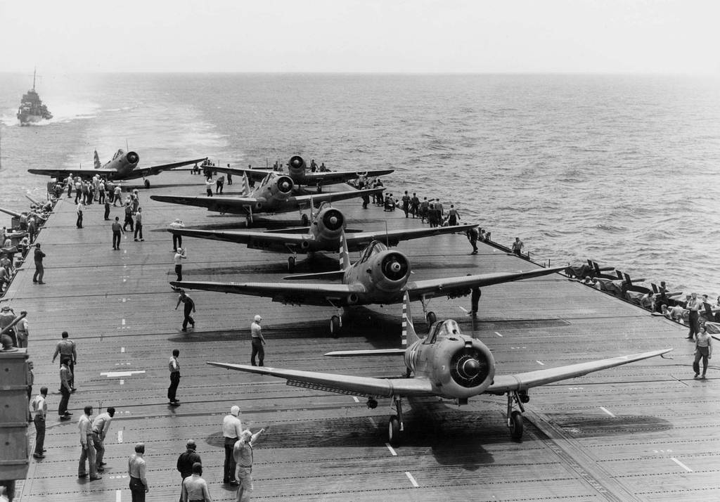 SBD_and_TBDs_taking_off_on_USS_Enterprise_%28CV-6%29_1942.jpg