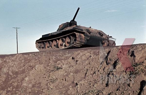 stock-photo-captured-russian-t34-panzer-tank-near-beresina-1941-3rd-panzer-division--12273.jpg