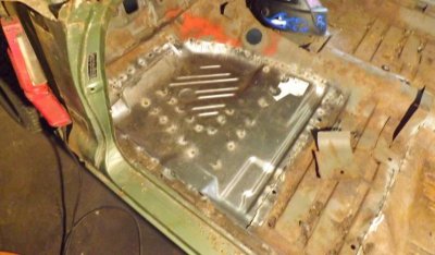 drivers floor pan tacked in.jpg