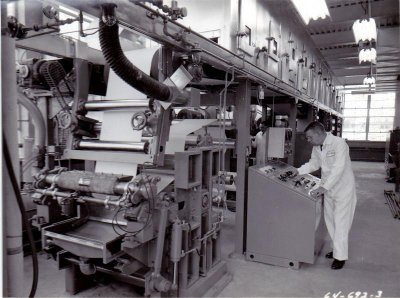 Dad working at his scale model paper maker.jpg