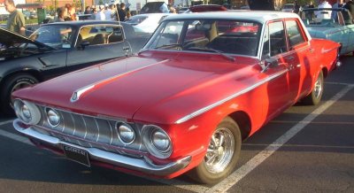 '62_Plymouth_Belvedere_Sedan_(Orange_Julep).jpg