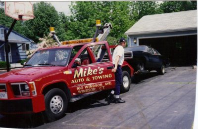 scotty and the charger going too the body shop.jpg