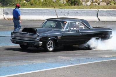 65 black dodge burnout.jpg