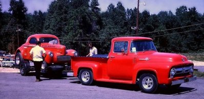 KS Pitman 40 Willys on trailer behind truck.jpg