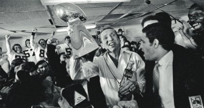 Oakland Raiders AFL 1981 excepting the Super Bowl Trophy.jpg