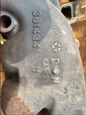 1972 400 exhaust cast pass side.JPG