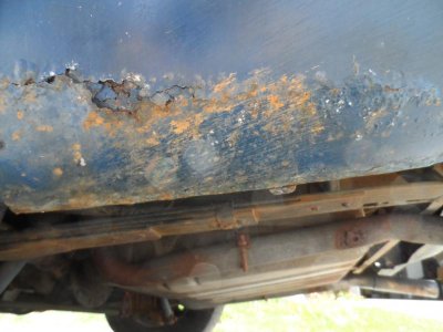 rust driver rear quarter.jpg